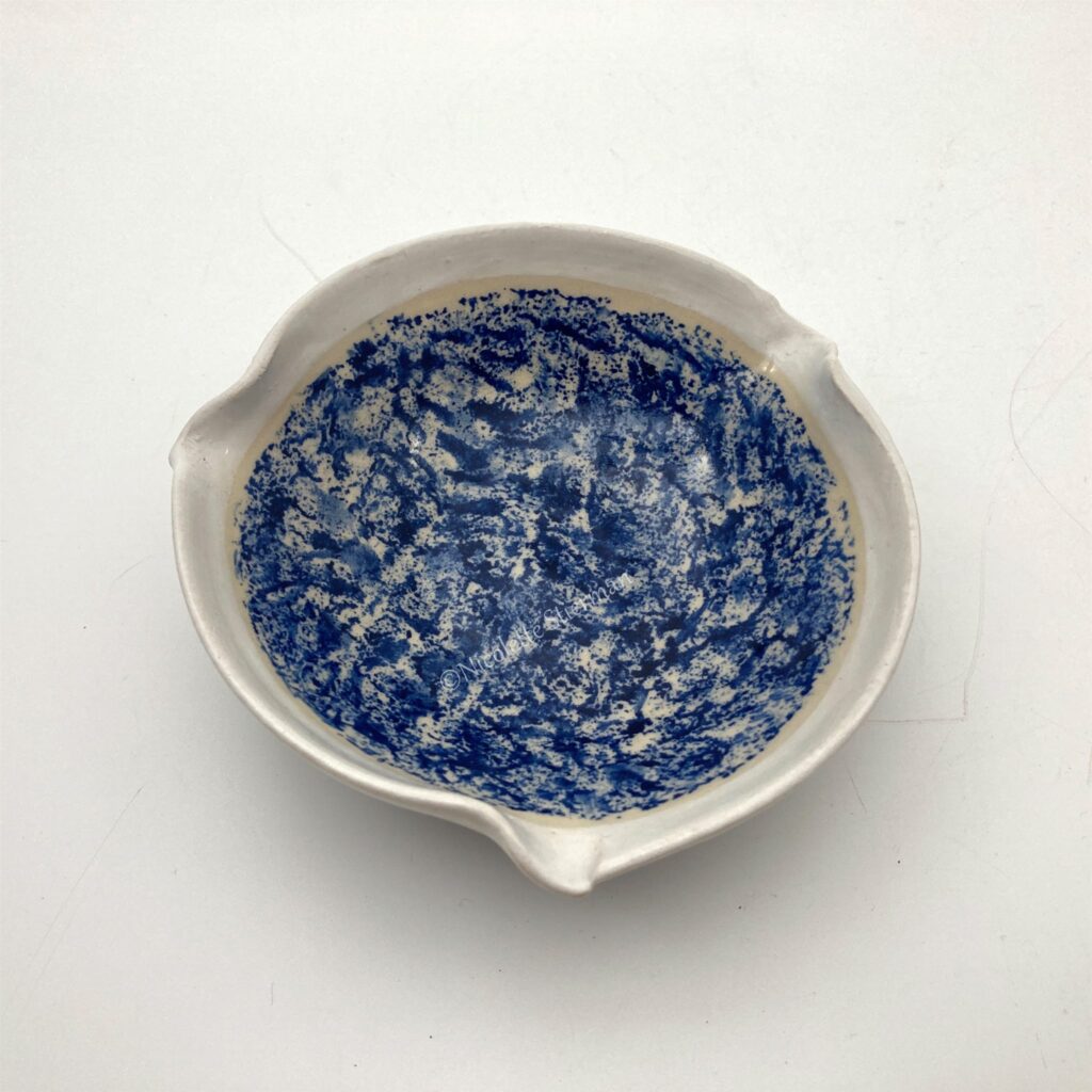 Schaaltje blauw gesponst