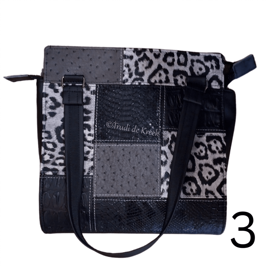 Handtas - Cover